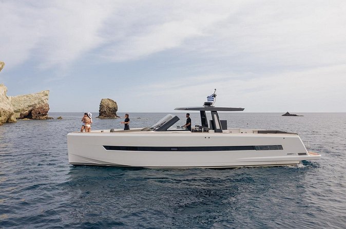 Caldera Private Cruise with Fjord 52 - Akrotiri’s lighthouse and the southern coast