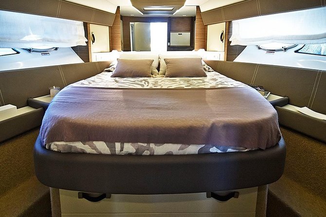 Fjordcruise in a Luxury Yacht Arctic Queen - The Tirpitz site and why low tide matters
