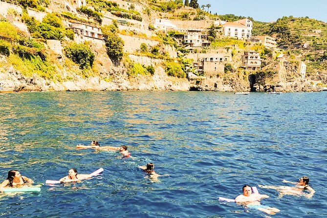 From Amalfi: Coast & Furore Fjord Boat Tour with Swim Break - Praiano and the changing coastline