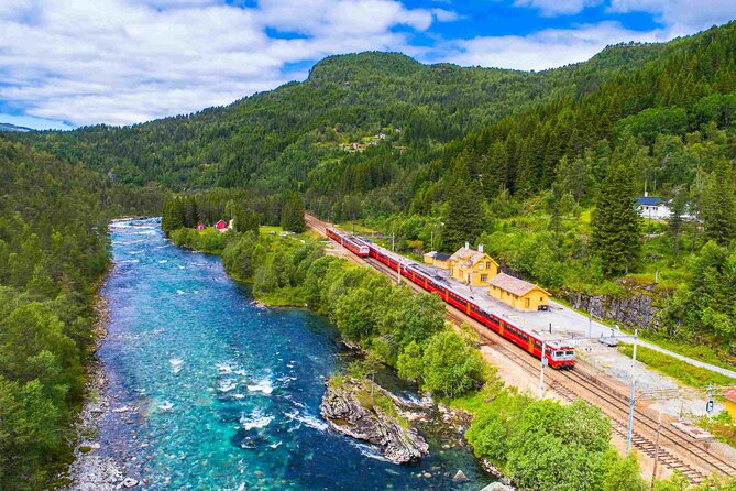 Guided tour to Viking Village, Nærøyfjorden Cruise & Flåm Railway - Tvindefossen gives you a quick waterfall stop