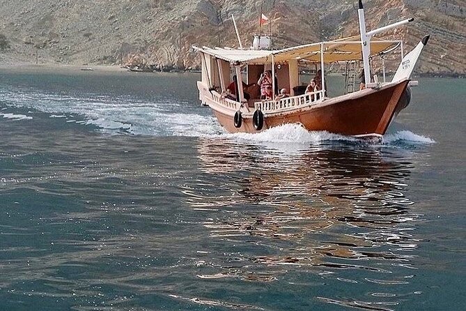 Khasab Dhow Cruise To Musandam Fjords With Lunch Onboard - Dolphin watching around 10:45 am