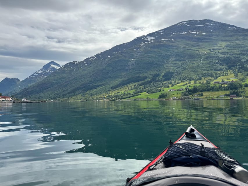 Olden: Experience Beginner-friendly Fjord Kayaking - Paddling beneath Olden’s mountains