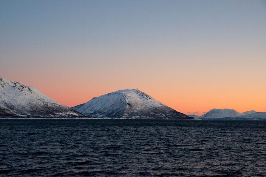 Tromsø: Arctic Fjord Cruise in Polar Landscapes - Leaving Tromsø with the Arctic Cathedral in view