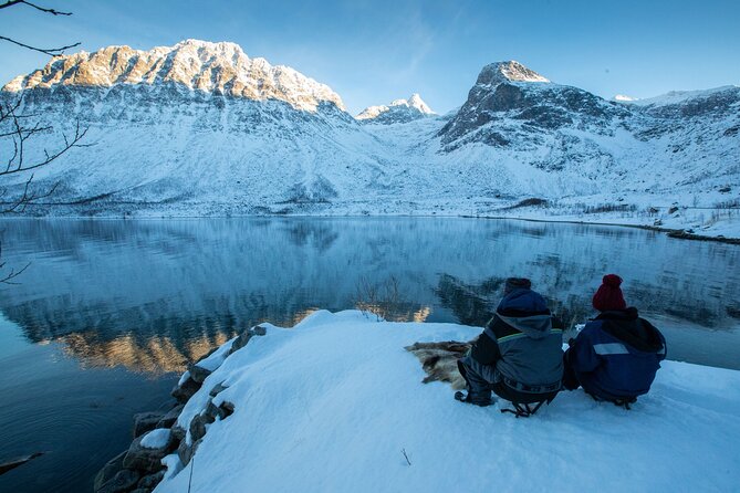 Tromso fjords road trip with fire in grill cabin by the beach. - What this Tromsø fjord trip is really like