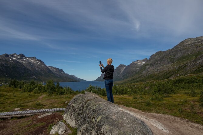 Tromso fjords road trip with fire in grill cabin by the beach. - Ersfjordbotn and the long fjord toward open sea